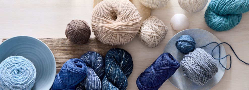 Beautiful sport-weight Purl Soho yarns in fresh blues and neutrals, including Daily Wool Sport, Cotton Pure, and Good Wool.