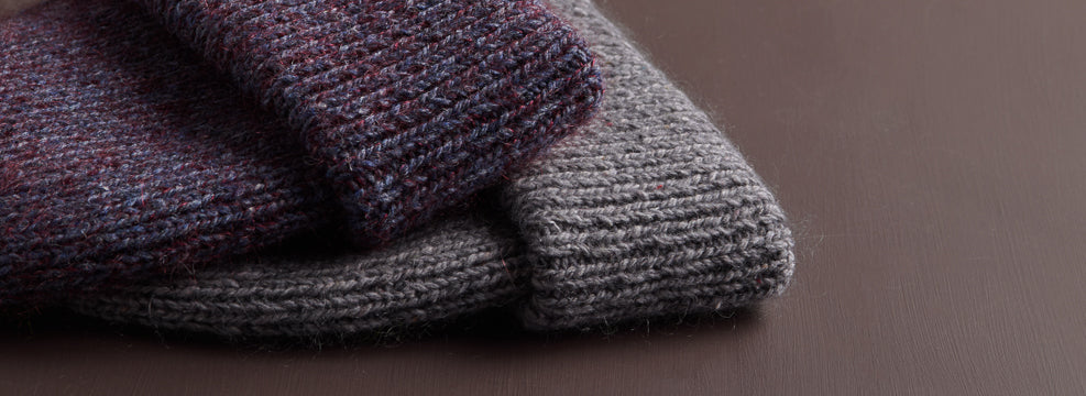 Combined our recycled wool yarn, Echo Wool, with our lace-weight mohair-silk yarn, Tussock to knit our free Duet Hat pattern!