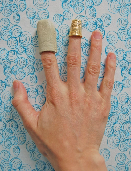 Video: Make a Thimble Liner From a Rubber Fingertip - Threads