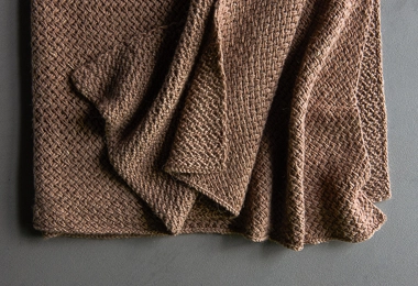 Plaited Throw