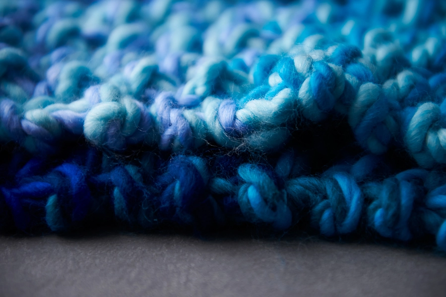 Scenic blanket, crochet. Underwater scene on a ripple background.