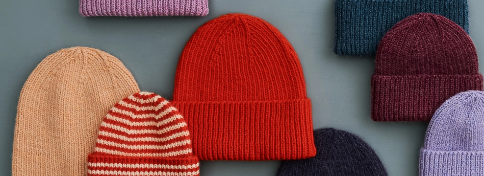 Knit our incredibly popular free Classic Ribbed Hat knitting pattern in our Cashmere Merino Bloom DK-weight yarn.