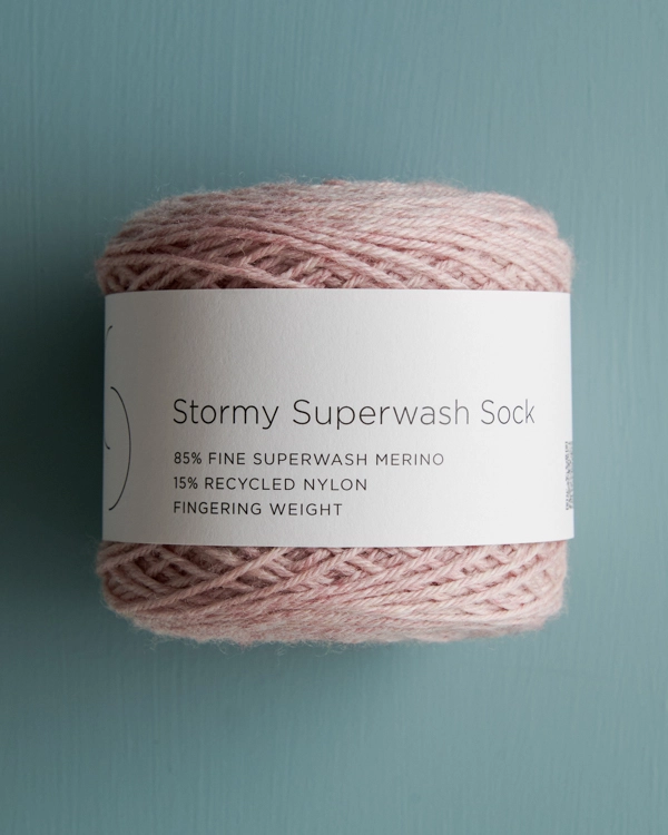 Ainur Berkimbay for Purl Soho: Pinwheel Baby Romper in Stormy Superwash Sock | Purl Soho