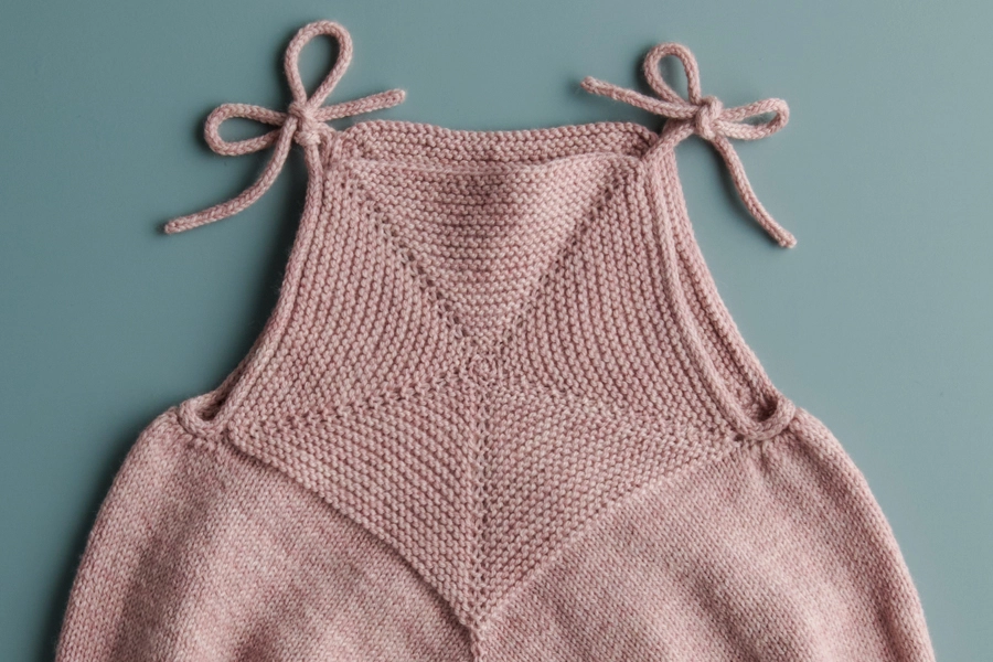 Ainur Berkimbay for Purl Soho: Pinwheel Baby Romper in Stormy Superwash Sock | Purl Soho