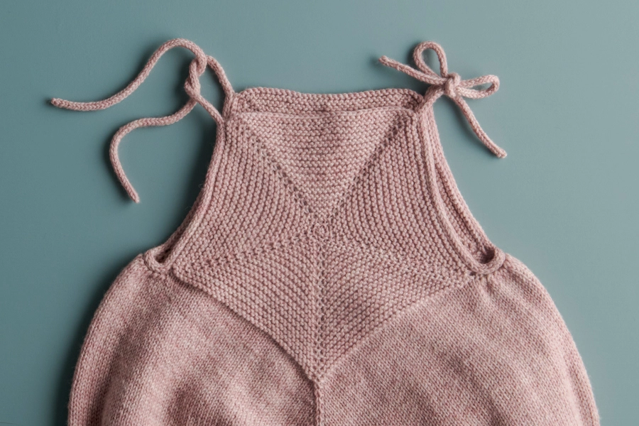 Ainur Berkimbay for Purl Soho: Pinwheel Baby Romper in Stormy Superwash Sock | Purl Soho