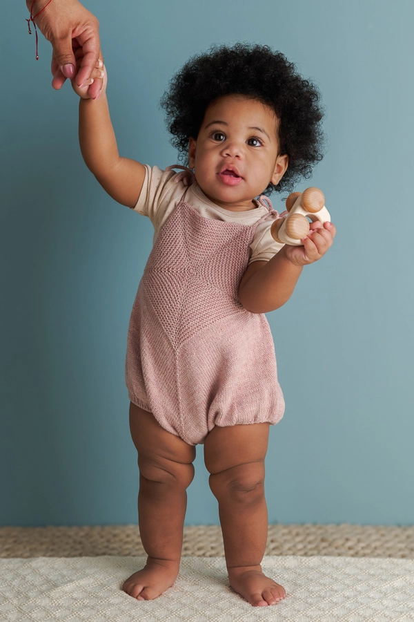 Ainur Berkimbay for Purl Soho: Pinwheel Baby Romper in Stormy Superwash Sock | Purl Soho