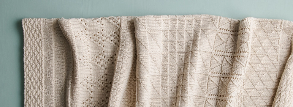 Knit the Porto Blanket, a free blanket knitting pattern made with one Knitting Yarn DK On A Cone, merino wool DK-weight yarn.