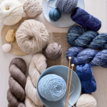 various Purl Soho sport-weight yarns, in skeins and wound into balls