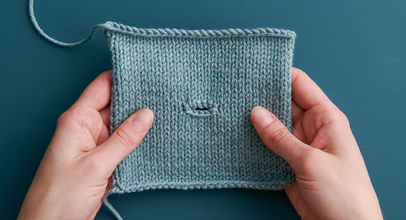 Follow our free Horizontal One-Row Buttonhole Tutorial to learn how to work an easy knitted buttonhole with this simple knitting technique.