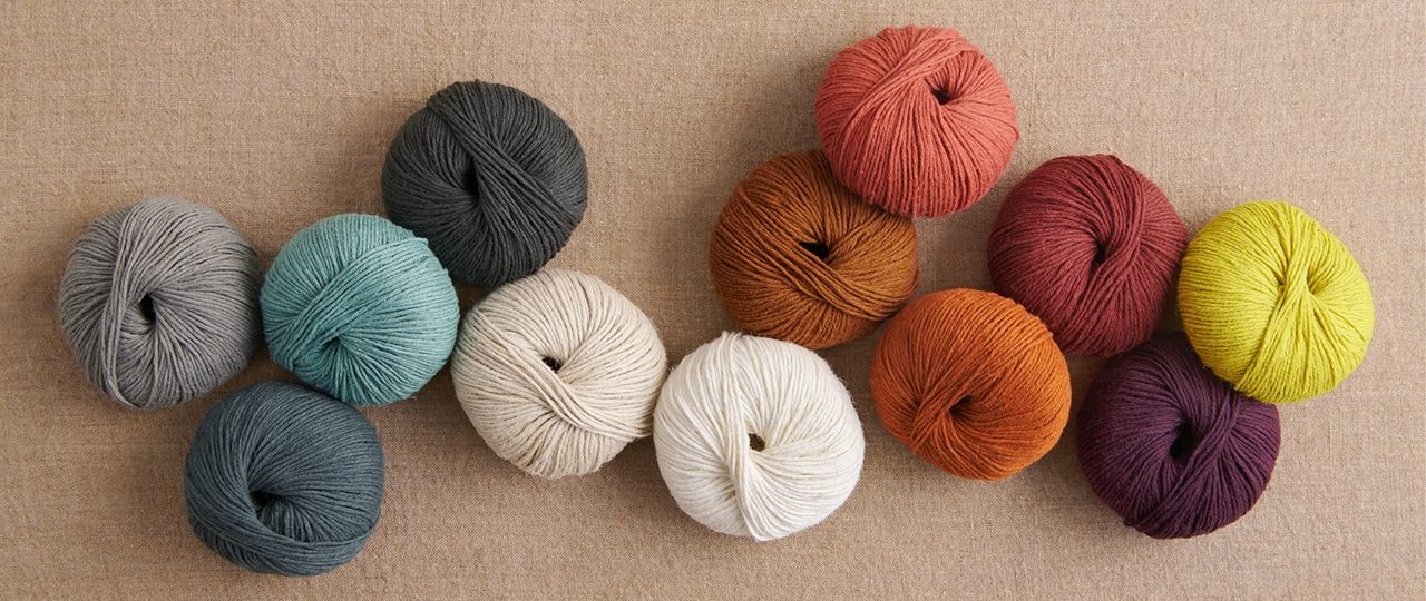 Explore all our supple cotton yarns and read all about cotton fiber and cotton yarn in our complete guide to knitting with cotton yarn!